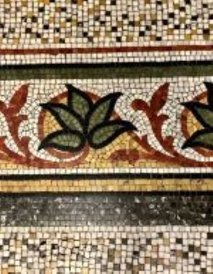 A photo showing the beautiful mosaic tiles located within the Brook Theatre
